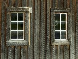 wooden facade with windows close up
