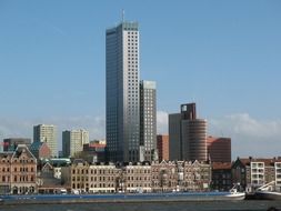 barge at city waterfront, netherlands, rotterdam