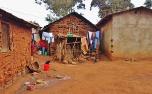 colorful clothing on lines at clay hats, tanzania, karatu