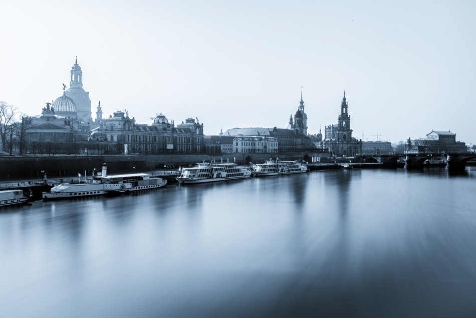 river port in germany reflected in water