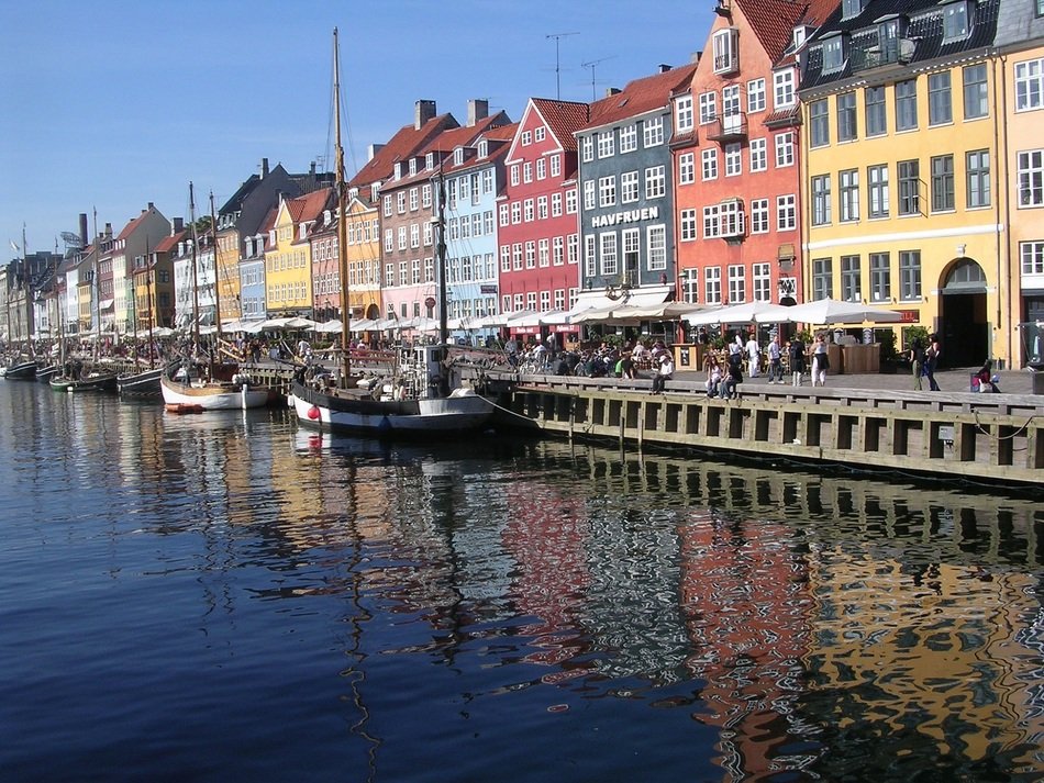 nyhavn waterfront, colorful facades at calm water, Denmark, Copenhagen