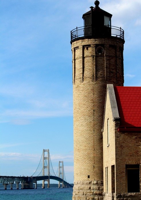 old mackinac point light at sky in view of bridge, usa, Michigan, Mackinaw City