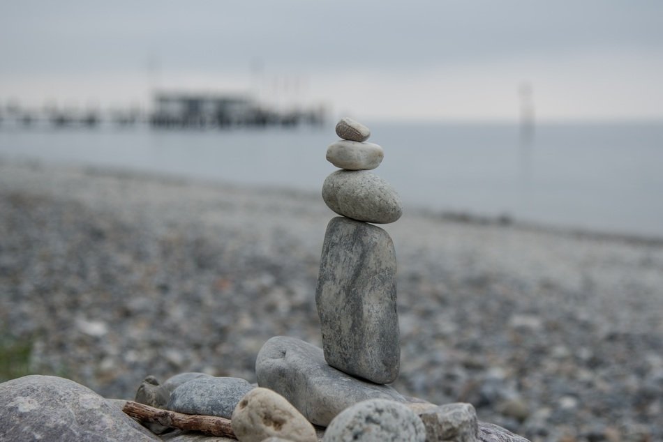 stones sculpture on a sea beach