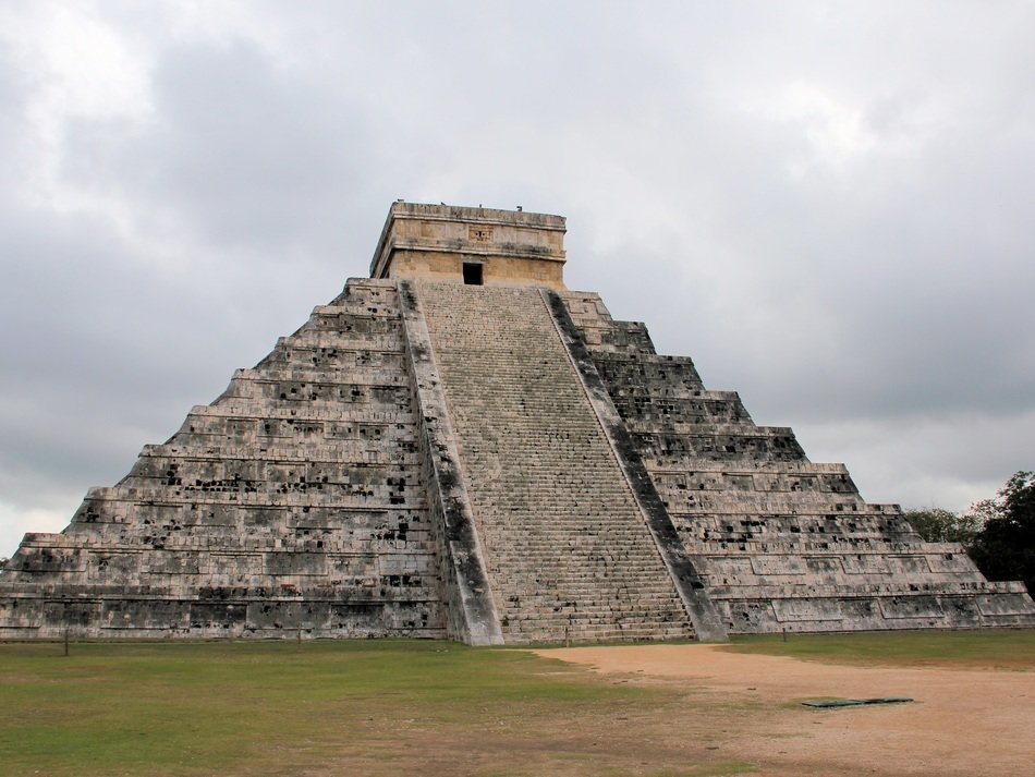 maya Temple of Kukulcan at cloudy sky, mexico, chichén itzá