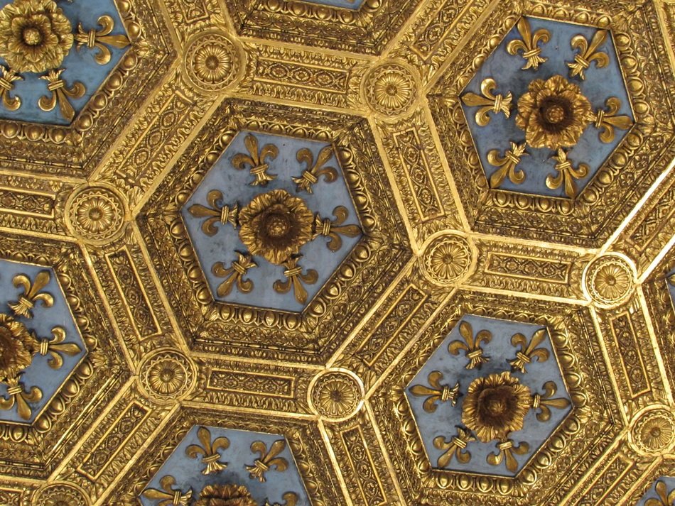 antique golden ornament on ceiling