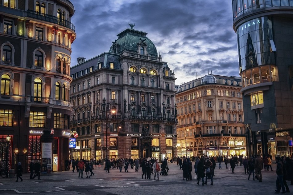 people in old city at evening, austria, vienna