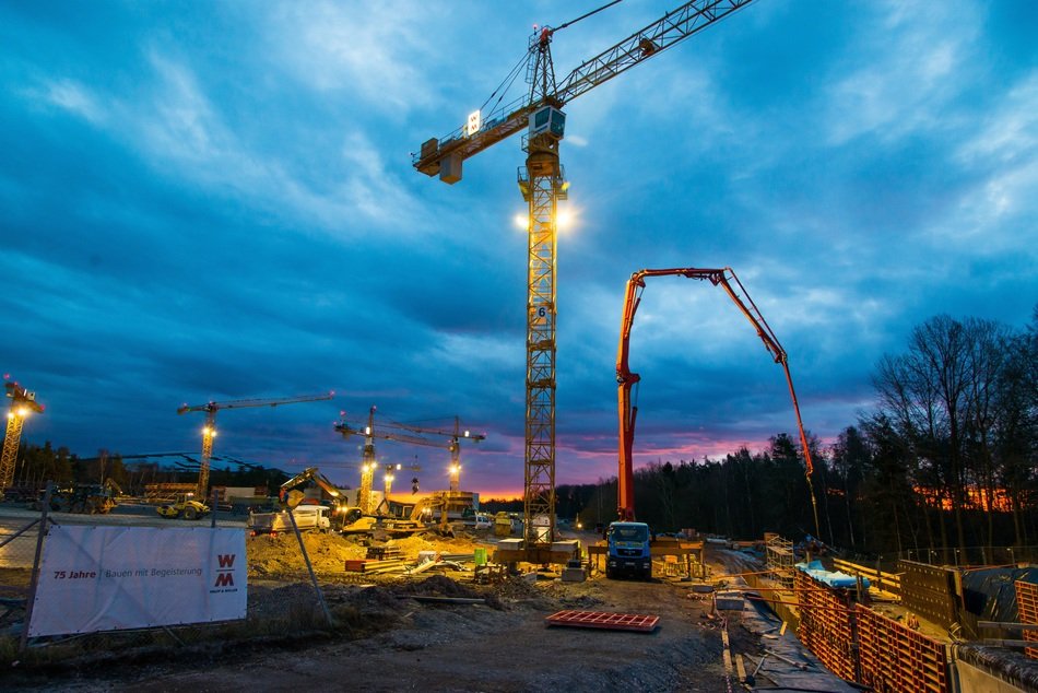 construction site building concrete crane evening