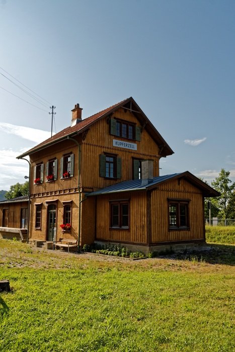 old wooden building of railway station on the field