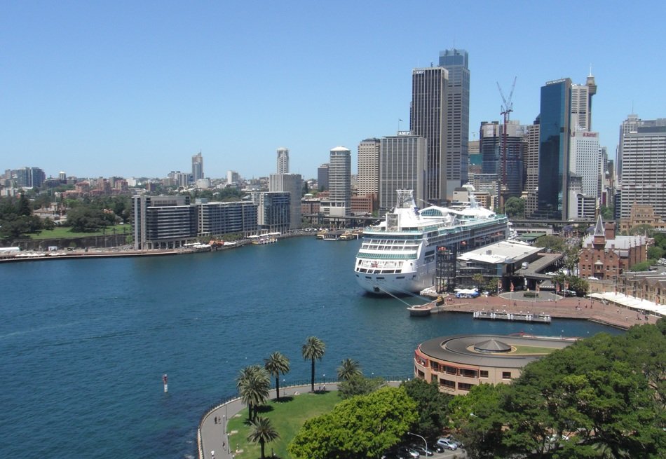 cruise ship at harbor in cityscape, australia, sydney