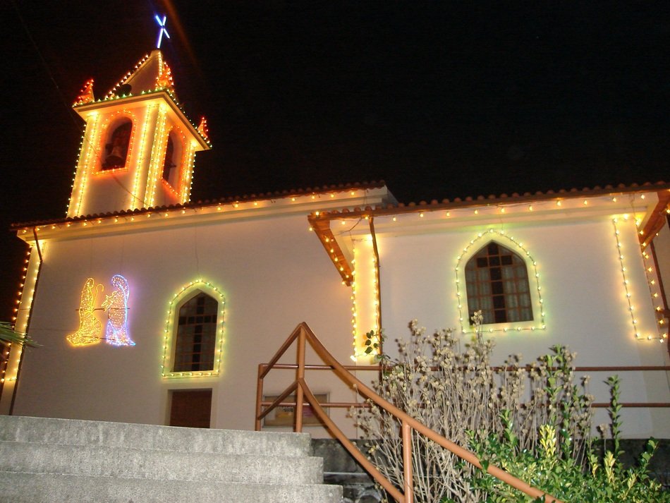 illuminated christmas decorations on church building