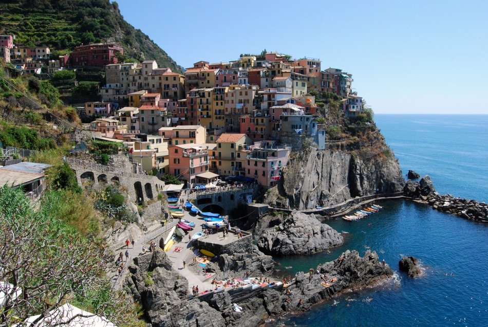 manarola, colorful houses on cliff above sea, italy, liguria, cinque terre