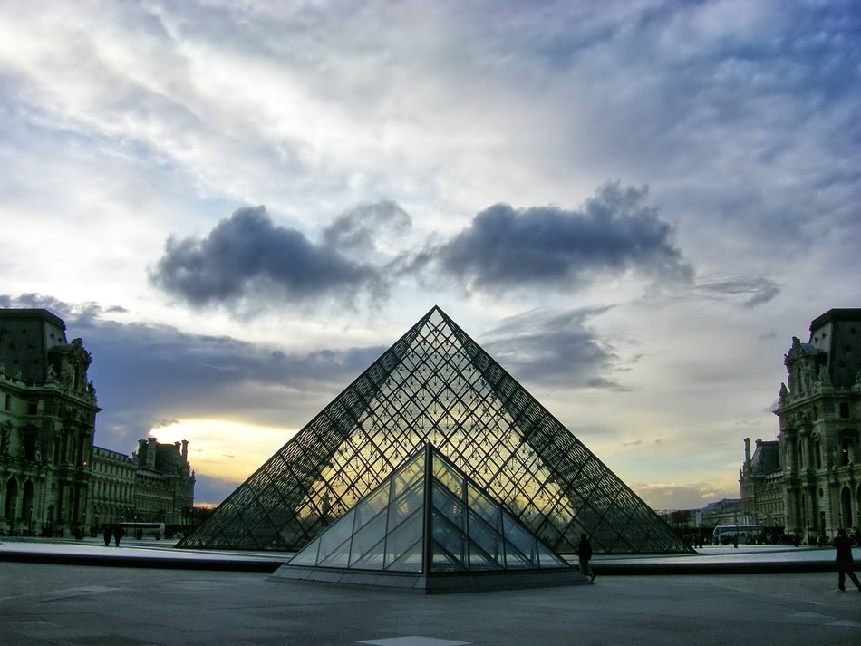 pyramids near the Louvre at sunset