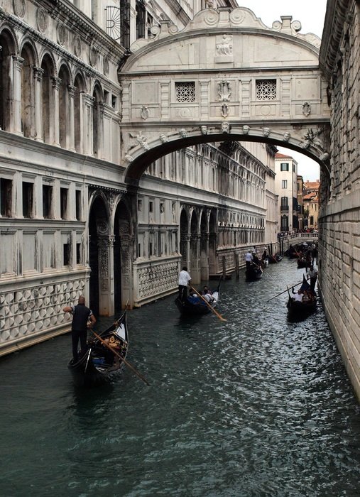 gondolas on channel in city, italy, venice