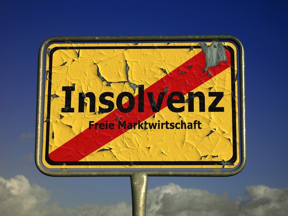 Insolvenz(Insolvency) yellow town sign