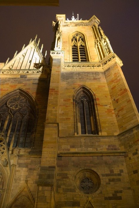 tower of gothic St Martin's Church at night, france, alsace, colmar