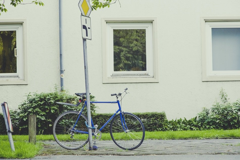 Blue bike near the house
