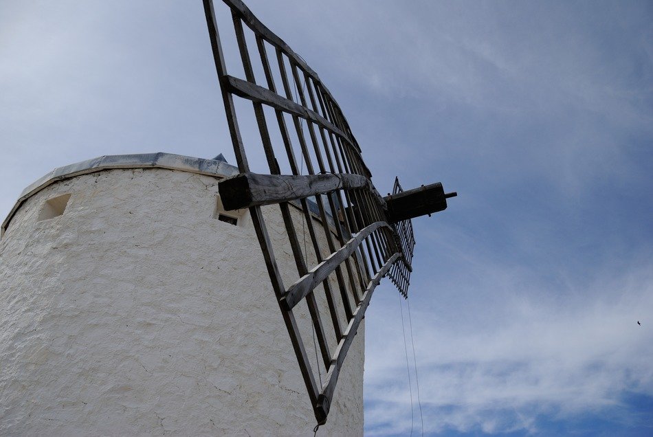 bottom view of windmill at sky