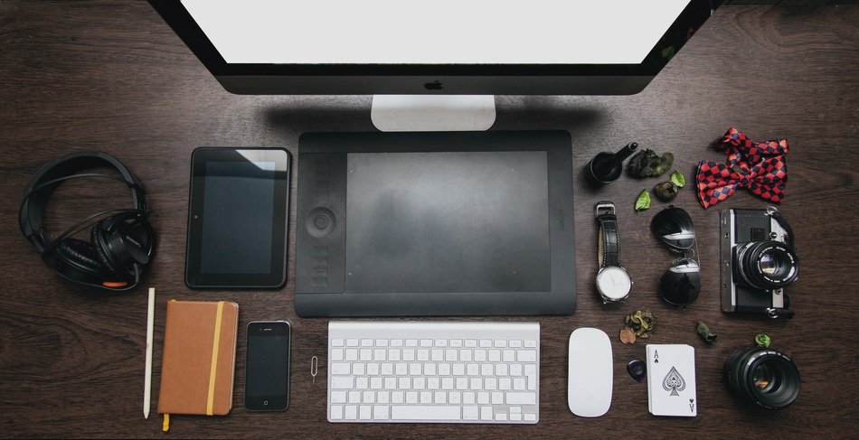 home office, computer, camera and gadgets on desk