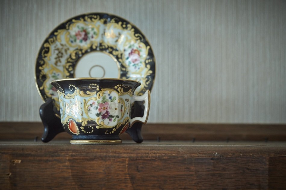 beautiful painted antique procelain teacup with saucer