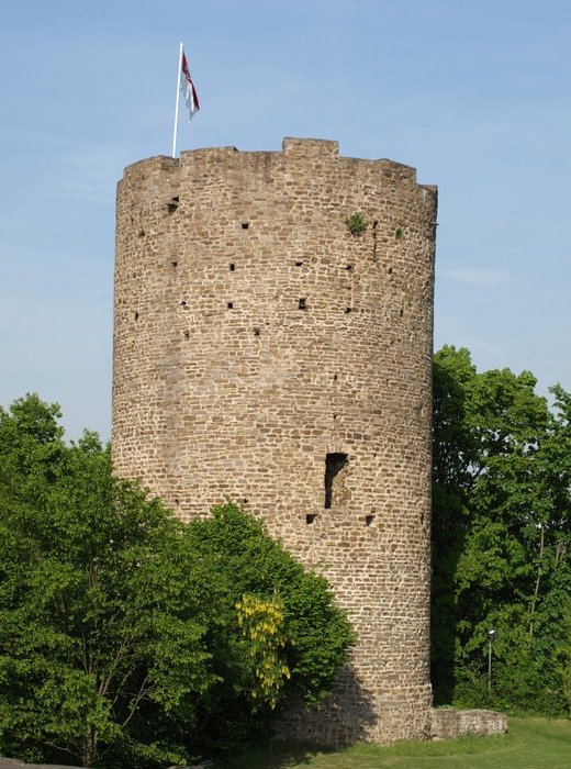medieval tower with flag, belgium, blankenberg