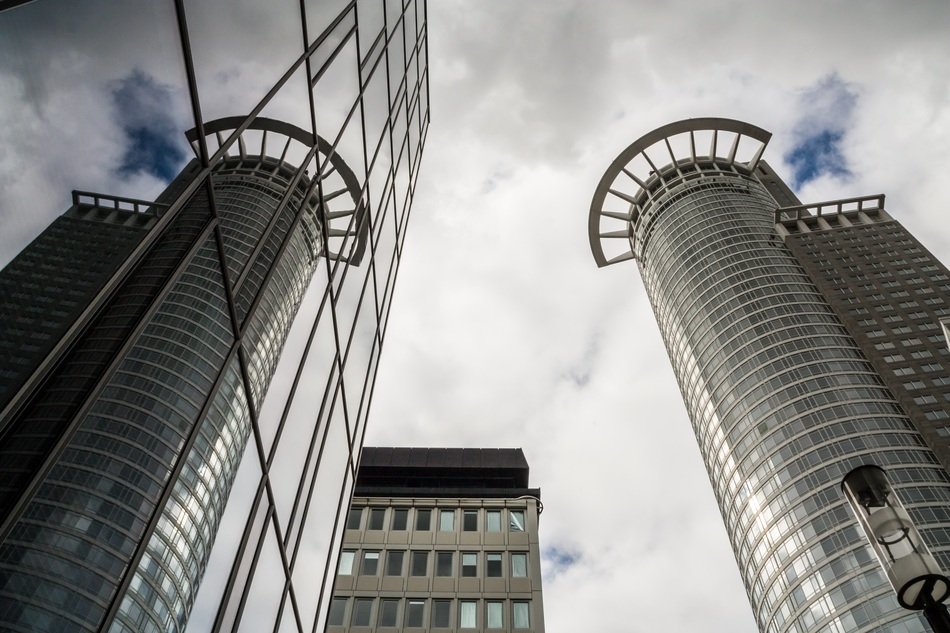 skyscraper and reflection on facade, germany, frankfurt