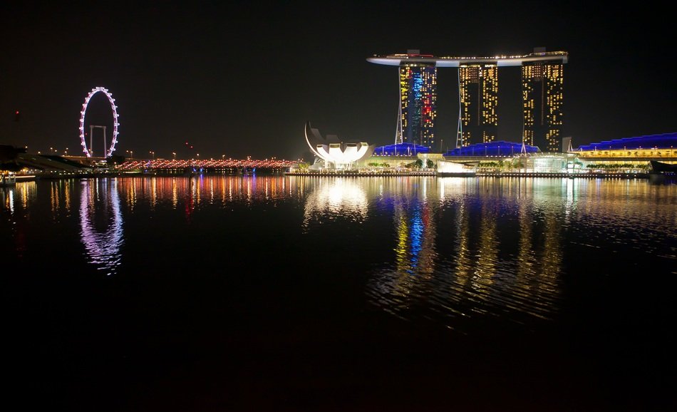 coastal town glows at night