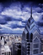 top of Liberty Place One skyscraper at clouds, usa, pennsylvania, philadelphia