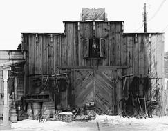 Black and white photo of the Wild West styled wooden building