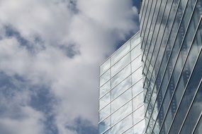 corner of glass facade at sky