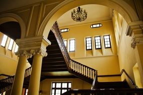 classic wooden staircase in the palace