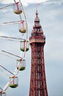 blackpool tower and ferris wheel at clouds, England, Lancashire