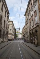 tram on railway in old city, ukraine, lviv