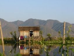traditional hut on inle lake at mountains, burma