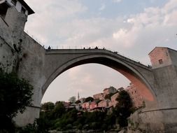 low angle view of old bridge in town, bosnia, mostar