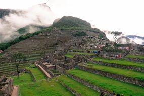 Stunning view of Machu Picchu, ancient ruins on mountains, peru