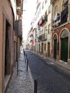 narrow street portugal lisbon architecture