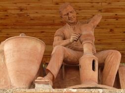 potter, clay statue of craftsman at work, turkey