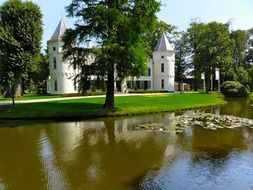 ra nijkerk buildings in summer park, netherlands