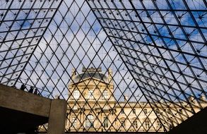 bottom view of louvre pyramid glass roof, france, paris