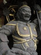 wooden sculpture of ancient japanese warrior