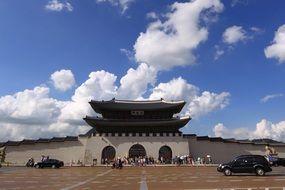 people at main gate of historic Gyeongbokgung Palace in South Korea, Seoul, Jongno-gu