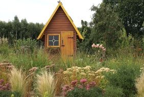 small cottage among the garden