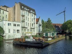 old buildings at water among the plants, germany, hamburg, Bergedorf