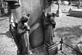 angels, old stone sculptures on graveyard