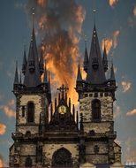 spires of gothic Church of Mother of God before Týn at dramatic sunset sky, czech, prague