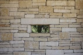 small window in stone wall