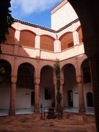 mudejar style patio with arches and columns