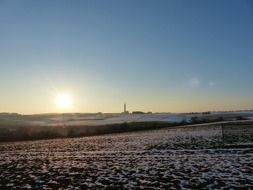 arable field at winter sunset, germany, jungingen