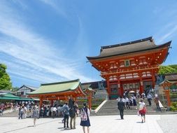 people at shrine gate, japan, kyoto