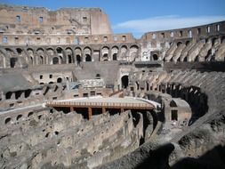 new wooden floor in interior of ancient colosseum, italy, rome